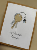 'welcome home' greeting card
